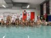 aquagym : le groupe prend la pose dans le petit bassin, sous la direction de Michel (au premier rang)